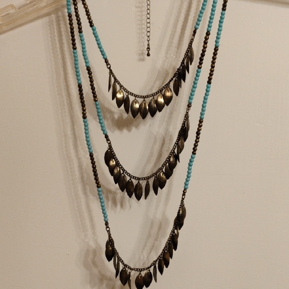 Elegant Brown and Blue Layered Necklace with Metallic Pendants